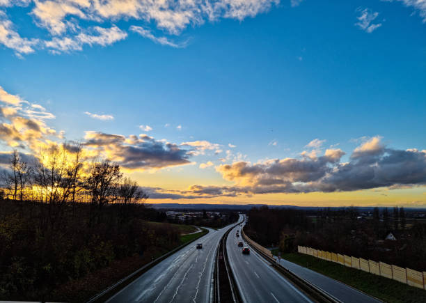 istock View of highway with blue sky 1359715152
