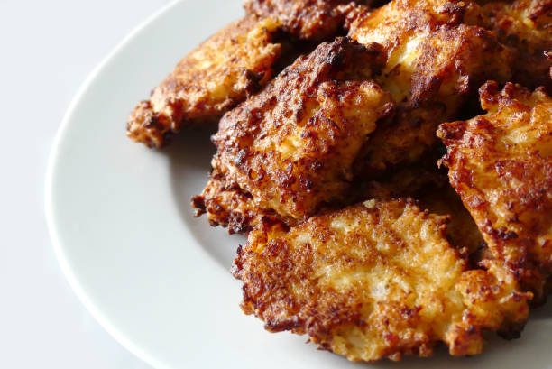 istock close-up pan fried cauliflower,fried cauliflower on a dinner fork, 1359719399