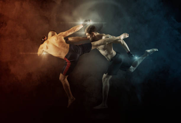 istock MMA boxers fighters fight in fights without rules 1359720695