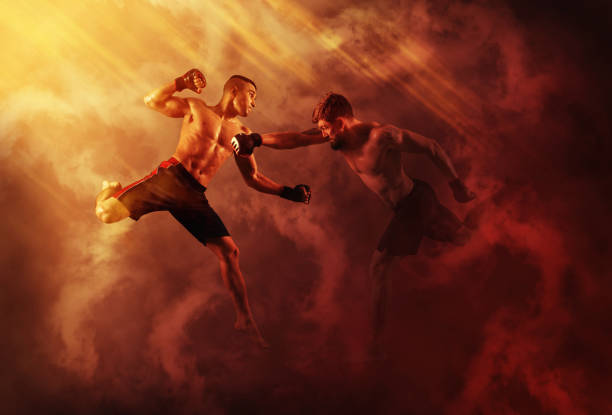 MMA boxers fighters fight in fights without rules.  Red smoke background