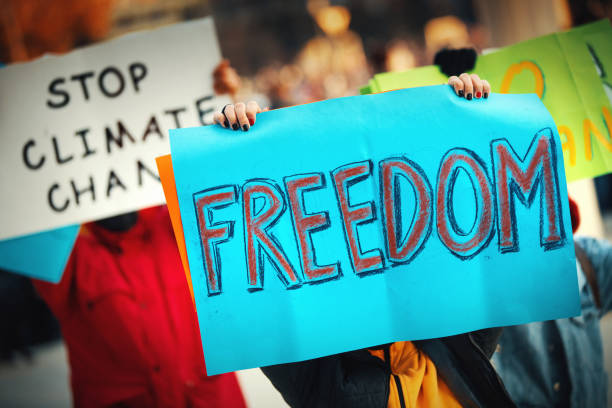 istock Protestors in the street. 1359726819