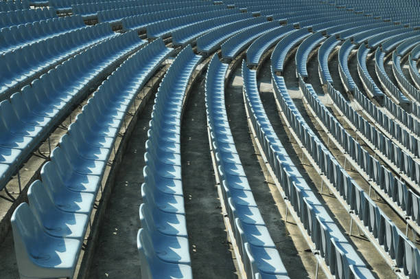 istock Rows of empty stadium seats during COVID-19 pandemic. 1359731857