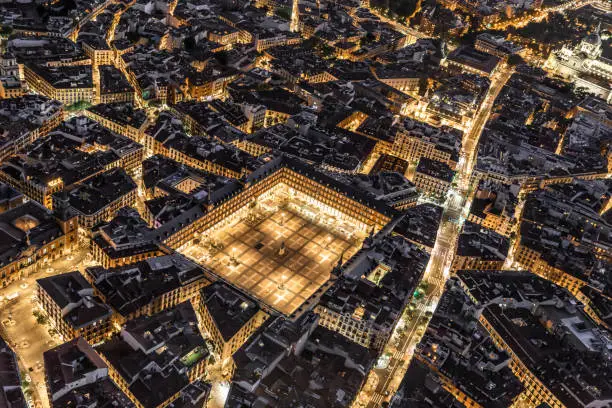 Night aerial views of Plaza Mayor and its confluence with Calle Mayor and Calle Atocha in the city of Madrid