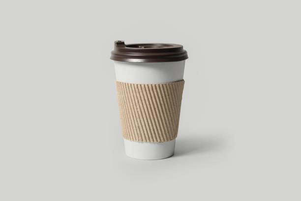 istock Takeaway paper coffee cup with cardboard sleeve on light grey background 1359736132
