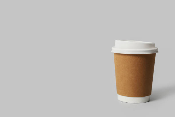 istock Takeaway paper coffee cup on light grey background. Space for text 1359736539