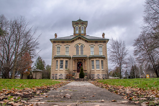 A low angle shot of Castle Killbride, a historic Victorian mansion in Baden (west of Kitchener), Ontario on an overcast day.
