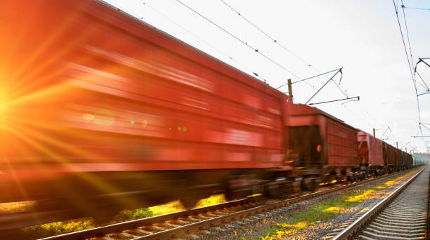 istock Freight cars move by rail at high speeds. 1359741104