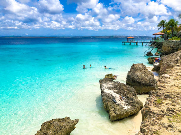 Bonaire people in Caribbean swimming