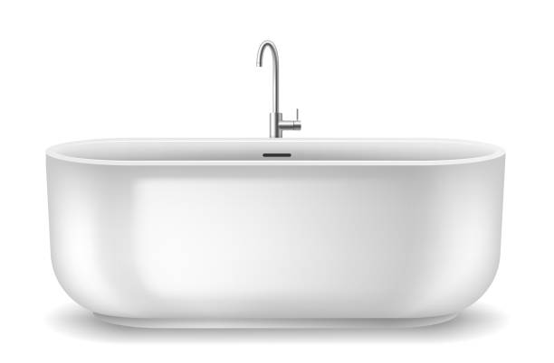 istock Stylish white bathtub from bathroom interior with steel faucet. Modern ceramic tub 1359748987