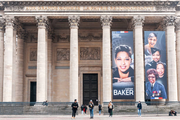 Panthéon in Paris, picture of Joséphine Baker on the facade, for her entrance in the mausoleum. Paris, Panthéon, December 6, 2021.  Large poster on the facade for Joséphine Baker enthronement in Panthéon. entrance sign photos stock pictures, royalty-free photos & images
