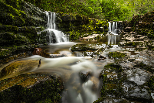 Long exposure of waterfall at Four Waterfalls hiking trail, Wales.