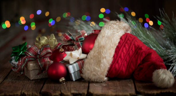 istock Santa Hat with Bokeh Lights 1359756240