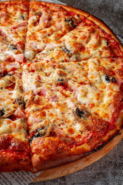 istock Fresh delicious Italian pizza on a gray stone table background 1359757016