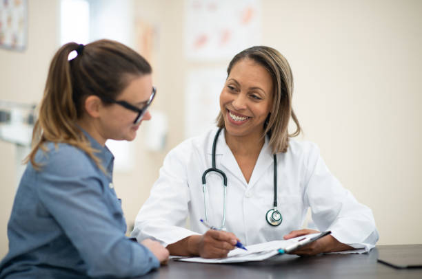 istock Doctor Meeting with a Patient 1359760273
