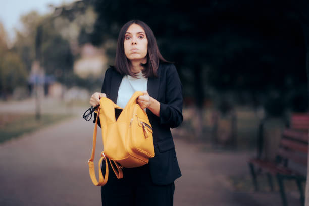 Funny Woman Looking in Her Messy Backpack Not Finding Keys Office worker forgetting or losing, personal stuff lost stock pictures, royalty-free photos & images