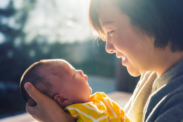 istock mother with her baby 1359771436