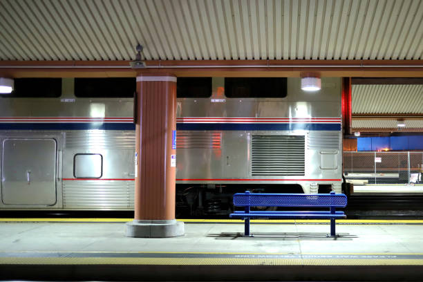 istock A passenger train car and lonely bench on Los Angeles Union Station's Platform 1359772928