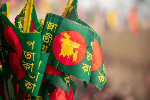 Hawkers selling Bangladeshi flags in the stadium on Victory day.