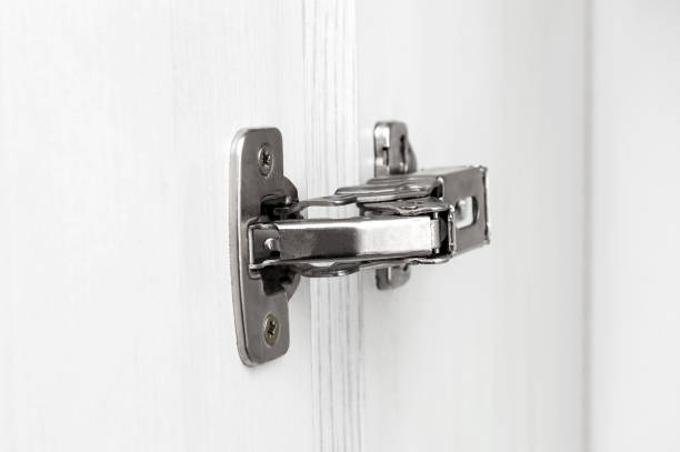 istock Metal hinges on the doors. Close up. 1359776623