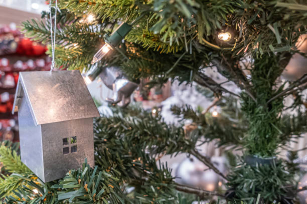 istock Decorations and baubles hanging from a Christmas tree 1359778141