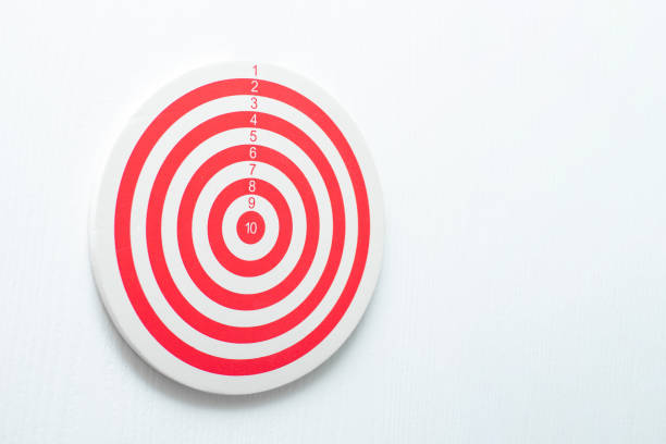 istock dartboard with arrow. creative concept idea for success with focus point on target to the winner in business with strategy management aim to leadership. 1359779753