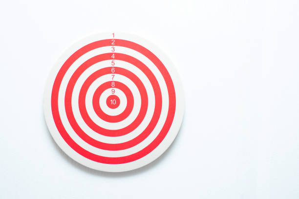 istock dartboard with arrow. creative concept idea for success with focus point on target to the winner in business with strategy management aim to leadership. 1359779754