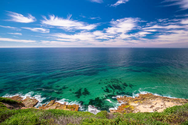 Newcastle Memorial Walk Views Newcastle, New South Wales, Australia - January, 12 2021: Crystal clear ocean views of Newcastle on a summers day as seen from the Newcastle Memorial Walk. newcastle australia stock pictures, royalty-free photos & images