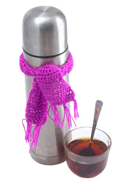 Thermos on a white background with a scarf