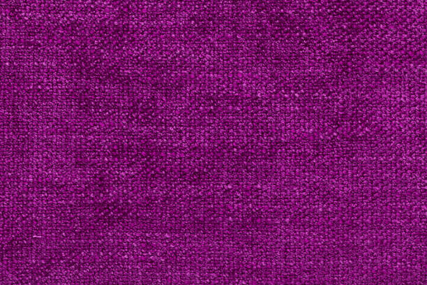 istock fiber texture polyester close-up. pink fleecy background. shaggy surface. fine grain felt red fabric. 1359786093