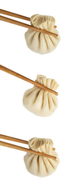 istock Set of tasty dumplings isolated on white 1359791294