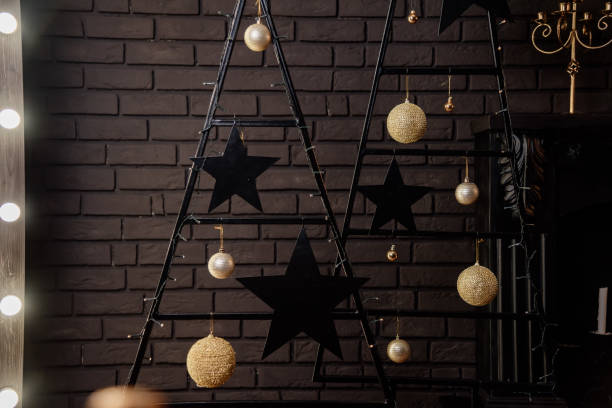 istock Christmas decorations in gold and black colors 1359795582
