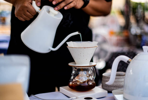 istock Barista making drip coffee by hand 1359798992