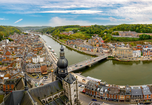 Beautiful city Dinant with church and bridge and famous for sax, Belgium.