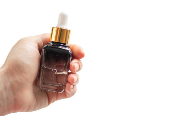 istock serum in hand isolated on white background 1359801384