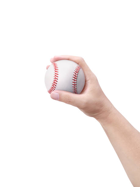 istock Player Gripping a New Baseball Isolated on White 1359803029