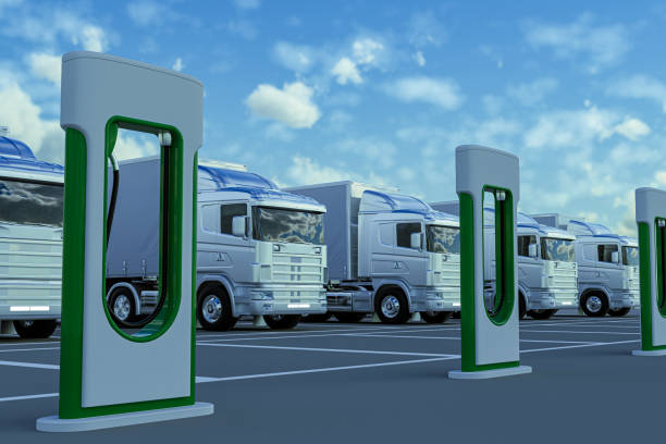 Clean energy logistics ideas Electric trucks in charging station alternative fuel vehicle stock pictures, royalty-free photos & images