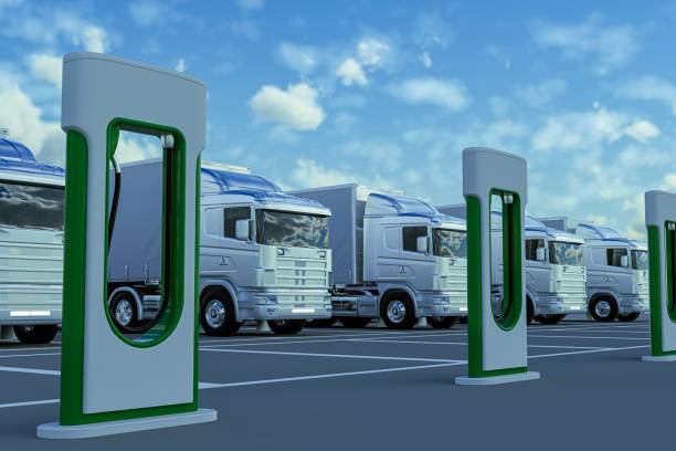 Clean energy logistics ideas Electric trucks in charging station electric vehicle stock pictures, royalty-free photos & images