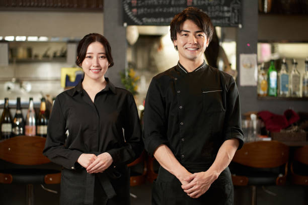 istock Asian men and women working in restaurants 1359805486