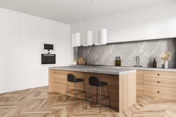 istock White and wood corner kitchen space with breakfast bar 1359811122