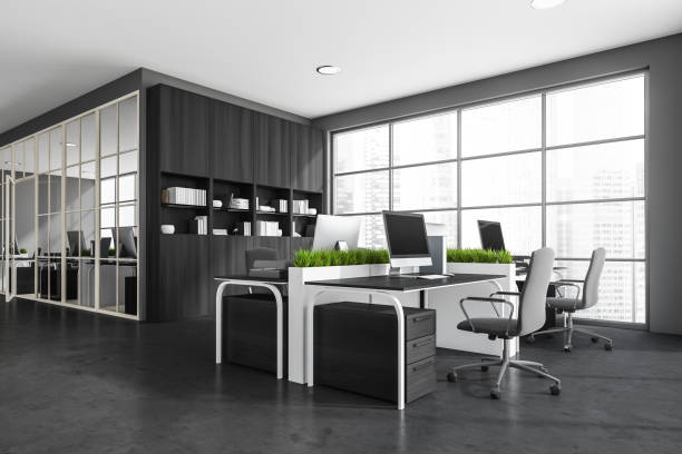 istock Corner view of dark grey panoramic hallway with working area 1359811444