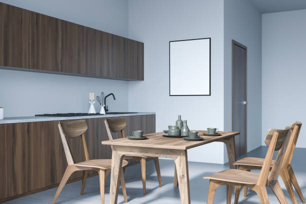 istock Wooden kitchen set interior with table and chairs. Mockup poster 1359812570