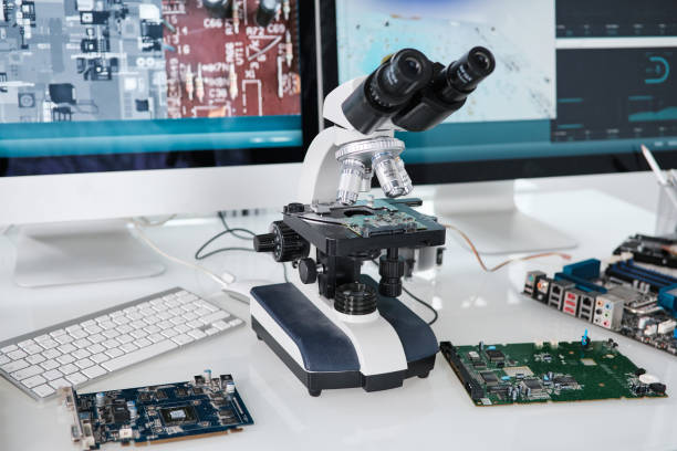 istock Microscope of scientific researcher standing on desk 1359815835