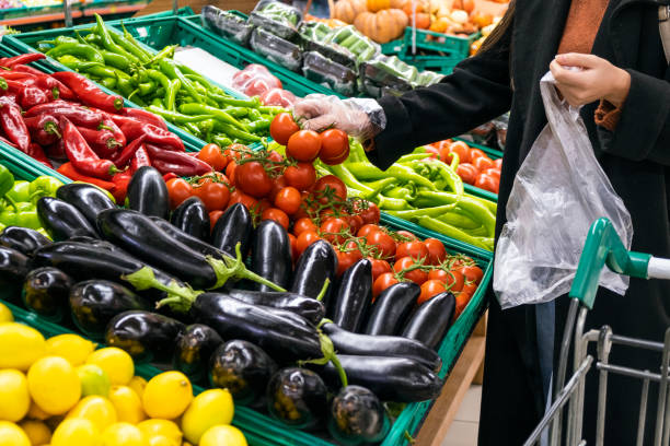 istock Fresh Fruit Shopping with Gloves 1359816036