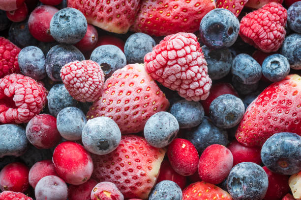 istock frozen mix strawberries blueberries raspberries and cranberries closeup 1359818086