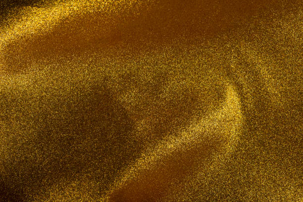istock Gold glitter background, Gold abstract background with blurred bokeh, Abstract bokeh lights with soft light background. 1359821989