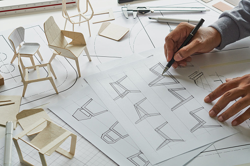 Diseñador boceto dibujo diseño desarrollo diseño plan de producto borrador silla sillón Wingback Muebles interiores prototipo fabricación producción. concepto de estudio de diseño. photo