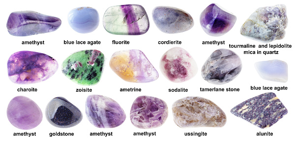 set of various tumbled violet stones with names cutout on white background