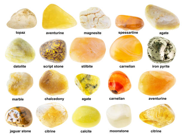 set of various polished yellow rocks with names set of various polished yellow rocks with names cutout on white background names of marbles stock pictures, royalty-free photos & images