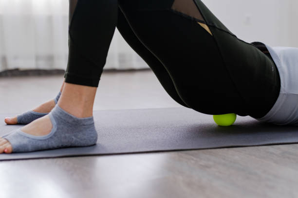 istock Close up Woman use Myofascial release massage balls on lower back selective focus 1359830097