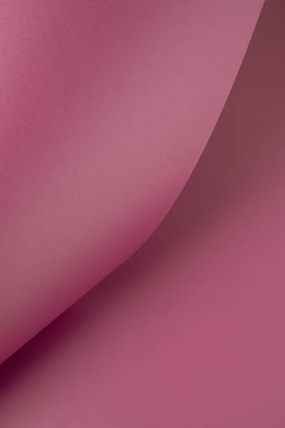 istock Pink purple gradient surfaces forming calm fluid background. 1359831309